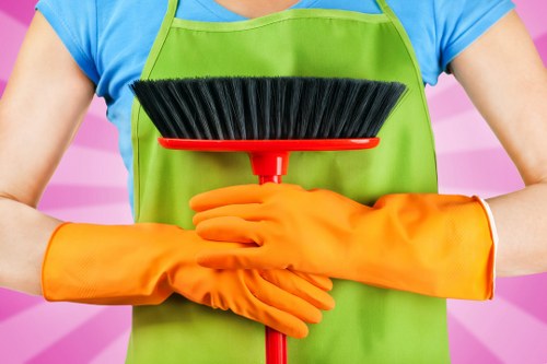 Commercial cleaning tasks in a Kingston workplace including floors and surfaces