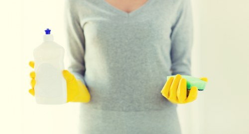 Cleaning cupboards and storage in a Kingston property