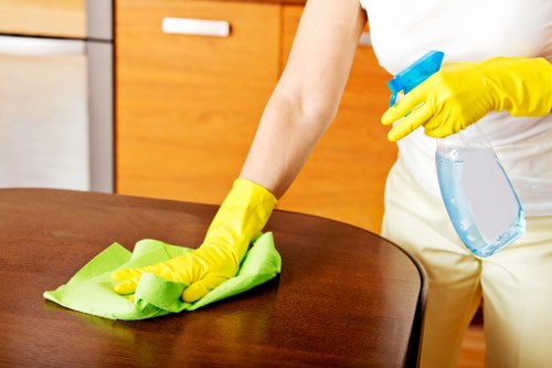 Local cleaner working in a Kingston apartment building with access and parking considerations